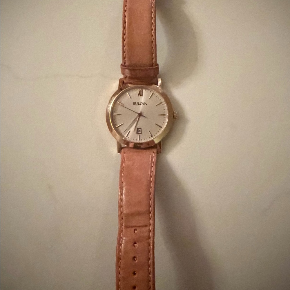 Bulova Watch w/ champagne toned face, rose gold hands, & light tan leather strap